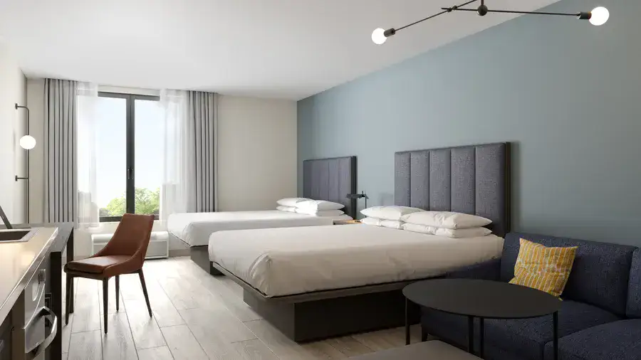 Hyatt Studios guest room with flexible sleeping arrangements