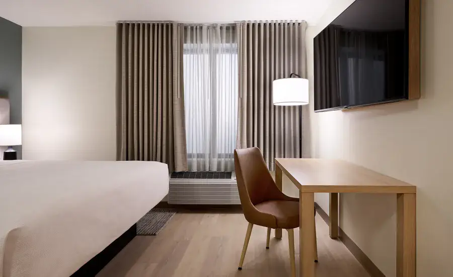 Work area and seating in a Hyatt Studios room